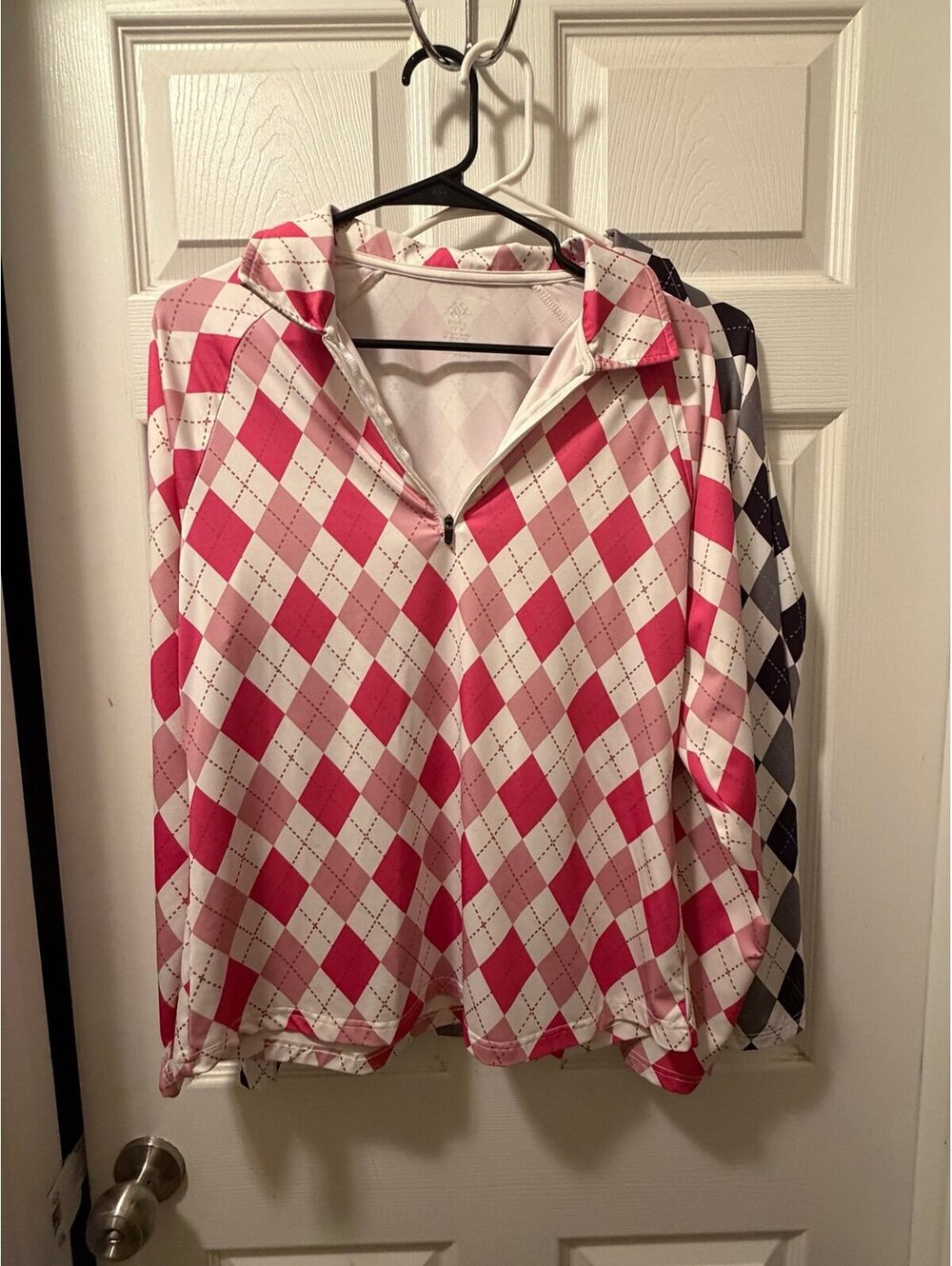 2 womenโs golf 1/4 zip pullovers